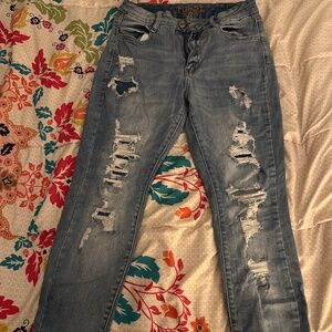Rue 21 curvy stretchy jeans w holes -size 10 -